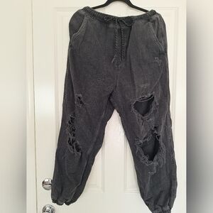 Free people black torn Joggers jeans size M